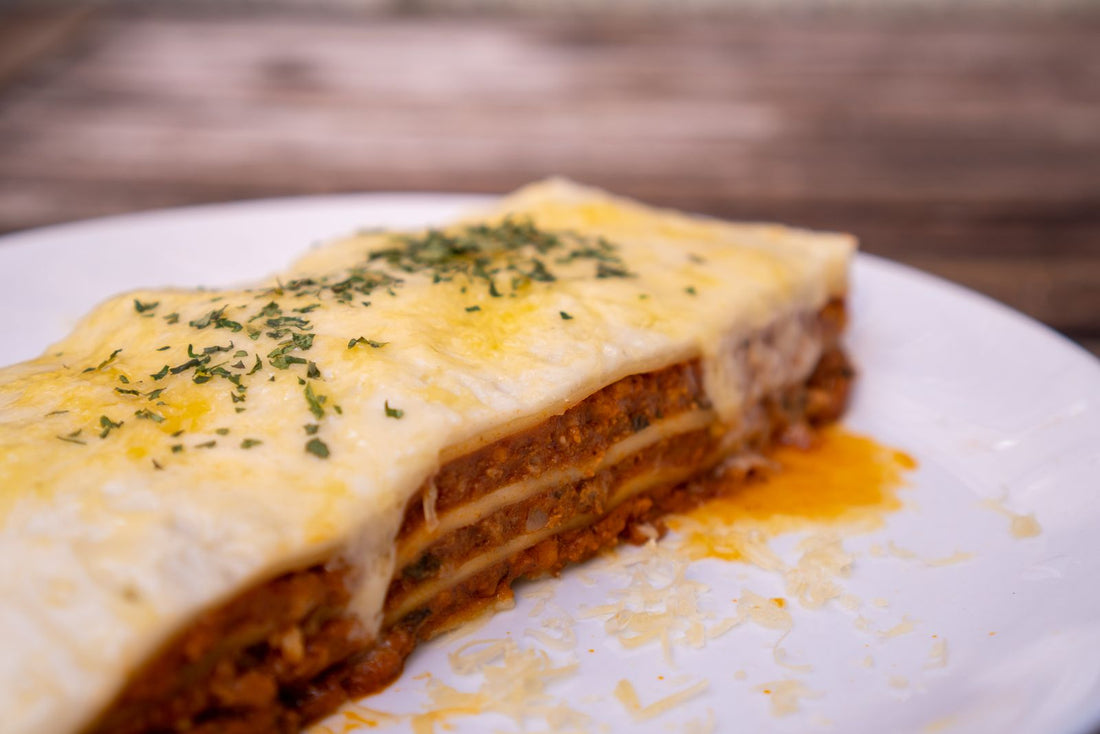 Slice of homemade lasagna on a plate – photo by Footage Kingdom, Pexels