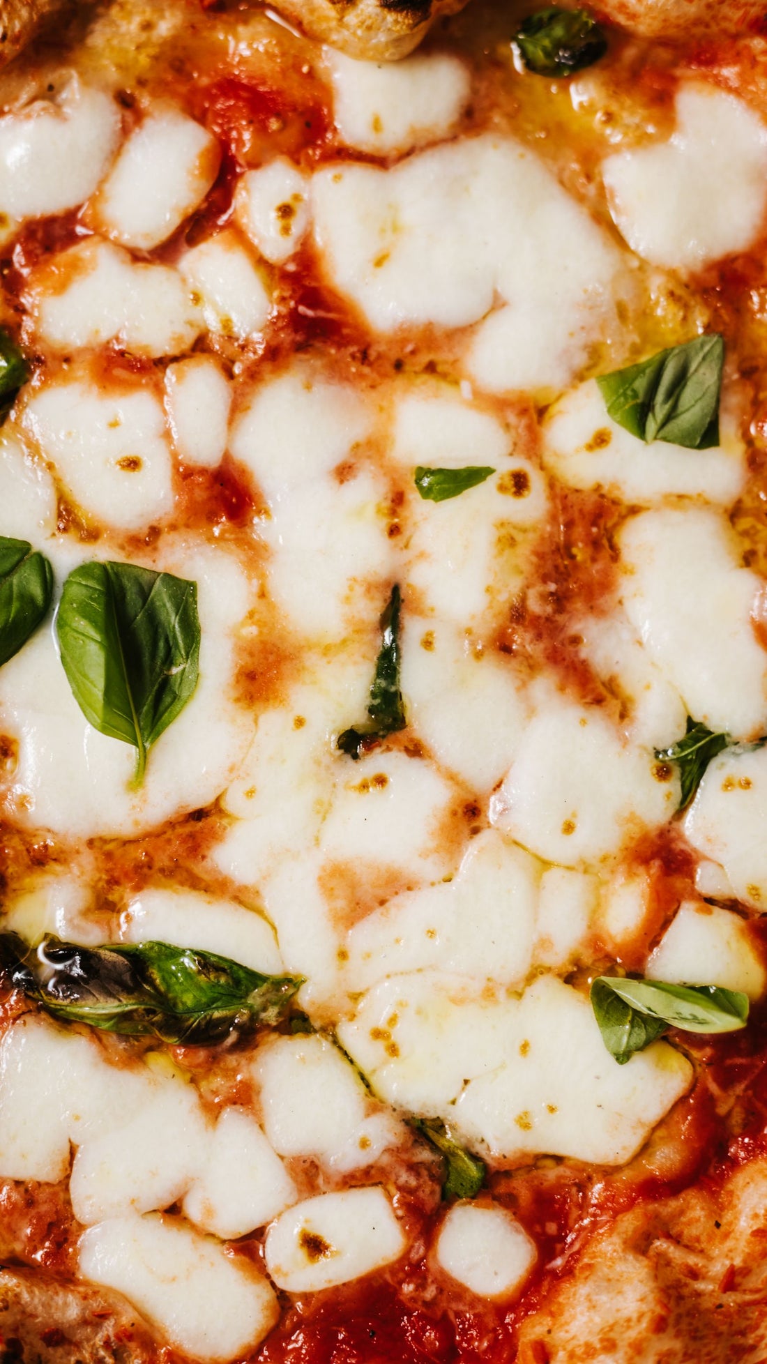 Margherita pizza with mozzarella and basil – photo by Rene Strgar, Pexels