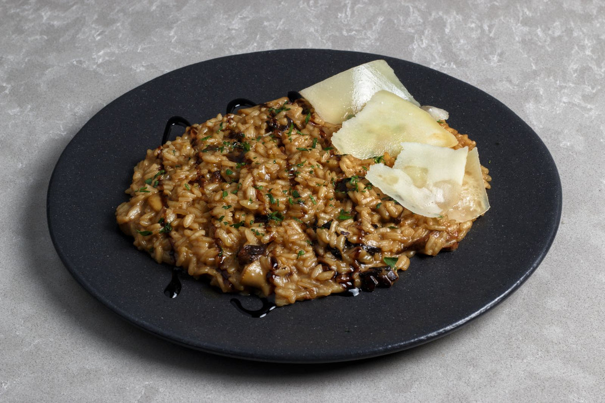 Mushroom risotto with Parmesan – photo by Adriano Bragi, Pexels