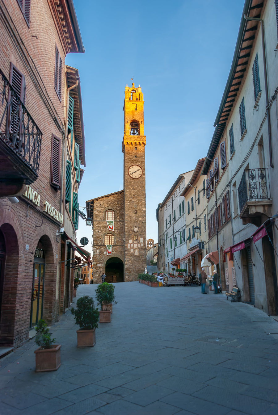 Montalcino street with the clock tower – photo by Siegfried Poepperl, Pexels